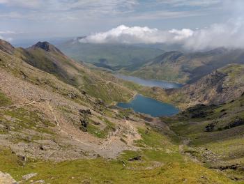 lakes with mountains around them